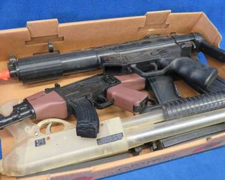 Lot 329. Four untested air-soft guns