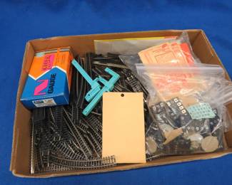 Lot 235. "N" gauge train track with couplers and more