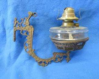 Lot 341. Antique wall-mount kerosene light. No bracket or chimney.