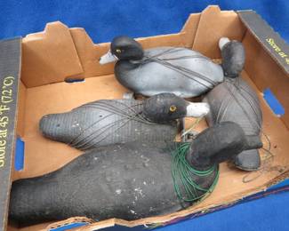 Lot 264. Four vintage wooden duck decoys