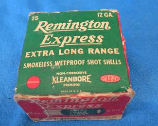 Lot 208. Vintage Remington 12-gauge shotgun shell box in fair condition with assorted old shotgun shells