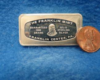 Lot 44. Franklin Mint Bank-marked sterling silver ingot. 65.1 grams.