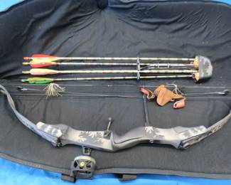 Lot 112. Bear Kodiak RH compound bow with quiver, arrows and case.