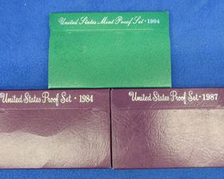 Lot 148. Three U.S. Mint Proof coin sets: 1984, 87, 94