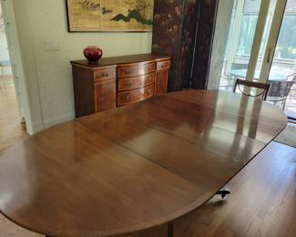 Baker mahogany dining  table with 3 leaves & pads                 Baker sideboard with 6 drawers & protective pads