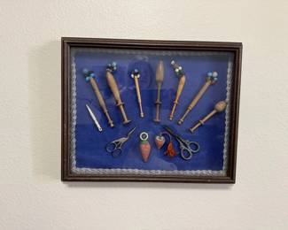Vingette of antique lace bobbins