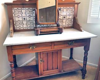 Wooden art deco table top mirror with demi-lune frame +
Antique tile-back wash stand with marble top