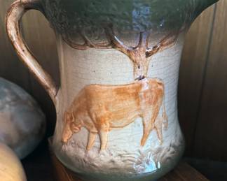Roseville pitcher with cow motif