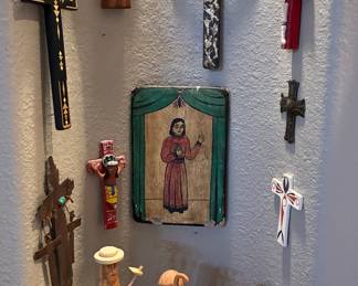 Hand carved santos, crosses