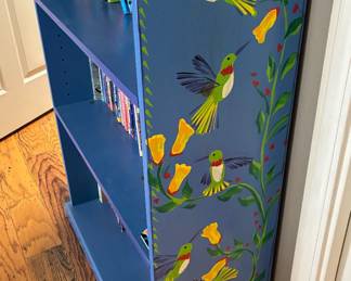 Hand painted bookshelf by Christine Waszak