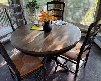 Kitchen table with 4 chairs, flowers for sale as well - (paperwork not included on table)