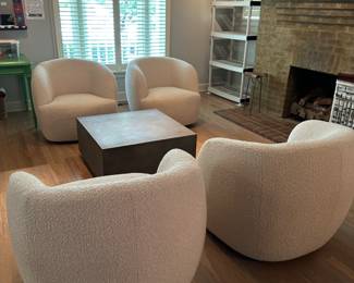 CB2 Gwyneth Boucle Swivel Chairs; Concrete Coffee Table 31" square.