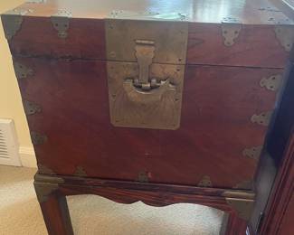 $240. Beautiful chest on a stand. Metal bass. Chest is 16.5 inches wide by 13 inches deep by 24.25 inches high while on the stand.