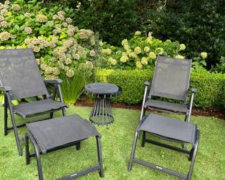 Pair of Kettler folding lounge chairs and ottomans. Table shown separately.