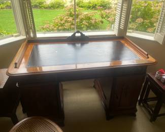 $240. This is an antique Australian walnut desk. 52 inches wide by 29 inches deep by 33 inches high. Originally $3500. Chair is included.