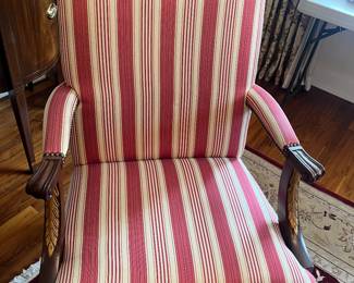 A set of Baker Furniture dining chairs. Two captains and eight side chairs. captains chairs measure 26 inches wide by 25 inches deep by 39.5 inches high. The eighth side chairs measure 22 inches wide by 24 inches deep by 39 inches high.