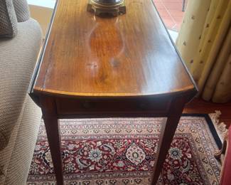 George the third mahogany Pembroke dropleaf table. True antique. Originally $2850. The table is 34 inches deep by 28 inches high by 20.5 inches wide. Each leaf is 12 inches when opened.