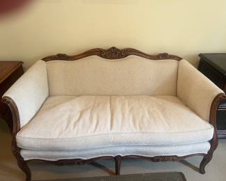 $340. An antique city. Beautiful wooden frame with neutral upholstery. 56.5 inches wide by 27.25 inches deep by 33.25 inches high.