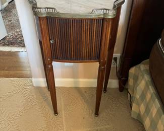 $420 Antique French mahogany table with rail trim and marble top. 19.5 inches wide by 11.5 inches deep by 29 inches high.