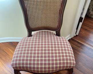 A set of four antique cane back and upholstered seat chairs. 21.5 inches wide by 20 inches deep by 37.5 inches high.