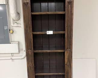 $150. Carved bookcase with four shelves.  Approx. 31"w x 14"d x 80"h.