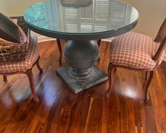 Metal base and top 39 inch diameter by 29 inch high dining table protective glass top available. Four chairs photographed next.