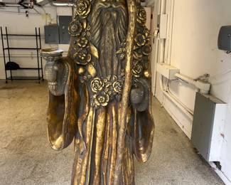 $130. Gold Father Christmas - resin we believe.  one as found issue that has been repaired.  Roughly 83" tall.