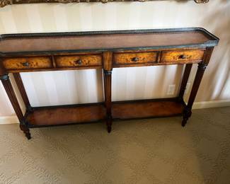$640. Theodore Alexander console table. 58.25 inches wide by 10.75 inches deep by 32.5 inches high.