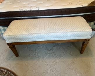 $190. upholstered and wood base bench. 48 inches wide by 17 inches deep by 20.5 inches high.