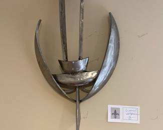 $90. Original metal art.