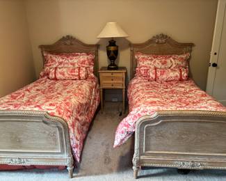 $400. Carved twin beds. French style detailing. 43.5"w x 80"d x 57"h. approximately. Bedding sold separately.