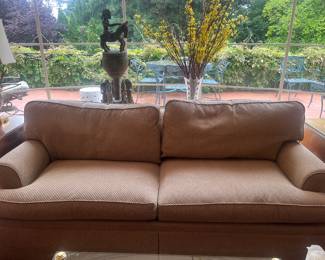another view of the sofa, which is more neutral in color than this photograph seems.