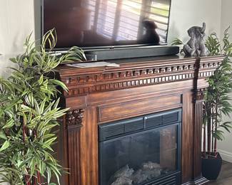 One of two electric fireplaces. Perfect for hanging your Christmas stockings. 