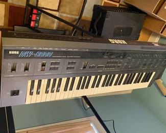 Korg - DW - 8000 Keyboard and Stand $ 320.00