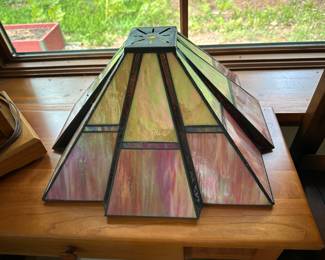 Several stained glass lamp shades