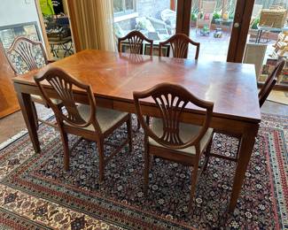 Dining room table, 6 chairs and 1 leaf.....