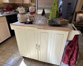 Kitchen island with butcher block top and storage