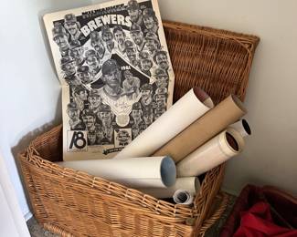 Posters and large wicker basket