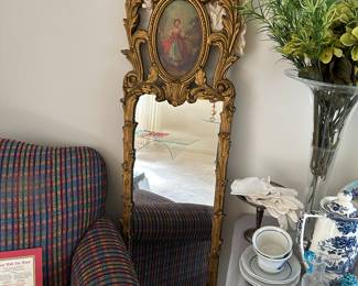Gold framed wall mirror