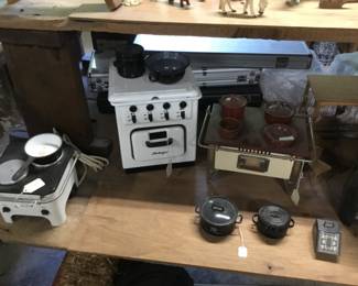 26. Toy stoves, kitchen toys.