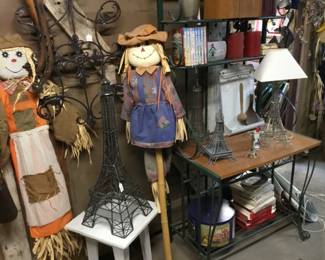 84. Fall decorations, Eiffel Towers, books, small decorations. 