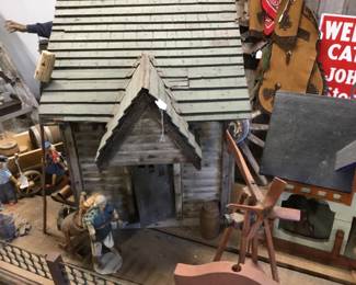 34. folk art house with people and animals 