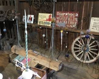 262. we have some weather vanes left, lots have sold , some balls and directionals. We have a few wagon wheels and signs as well