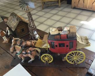 361. horse and traveling carriage, log house, windmill. Sold together or separately.