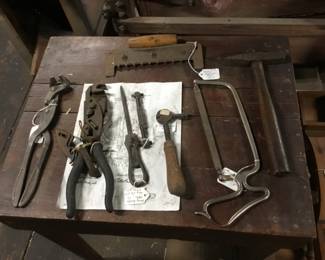 182. antique metal tools.
