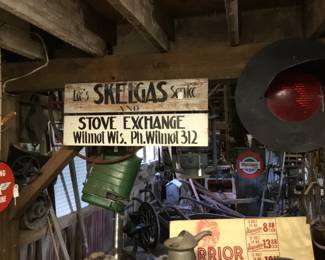 188. Wooden sign , Skelgas stove exchange in Wilmot, WI