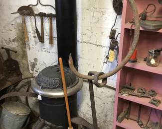 117. cast iron stove and tools