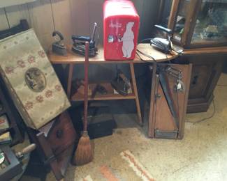 381. Antique irons, cutting board, household items 