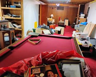 pool table has balls and sticks