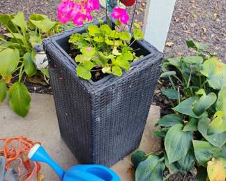 Planter is sold water can is 1/2 off